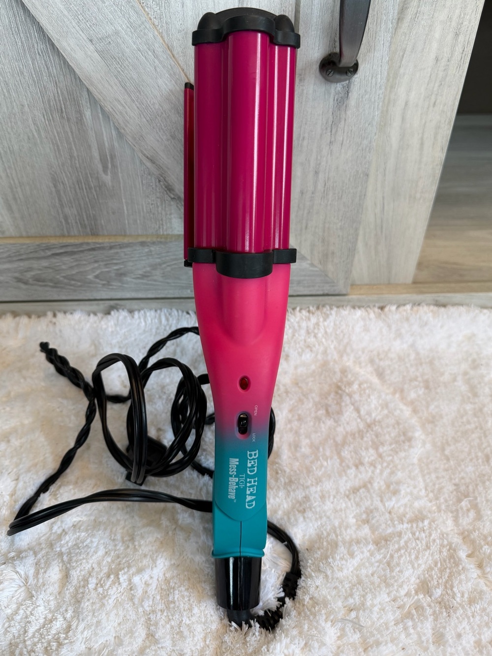 Bed Head Mess Behave Deep Waver in a pink and blue ombre color scheme